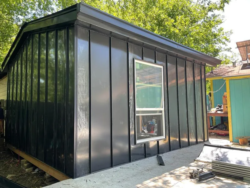 Black standing seam metal wall panels for Metal Roof Installation in Menomonie