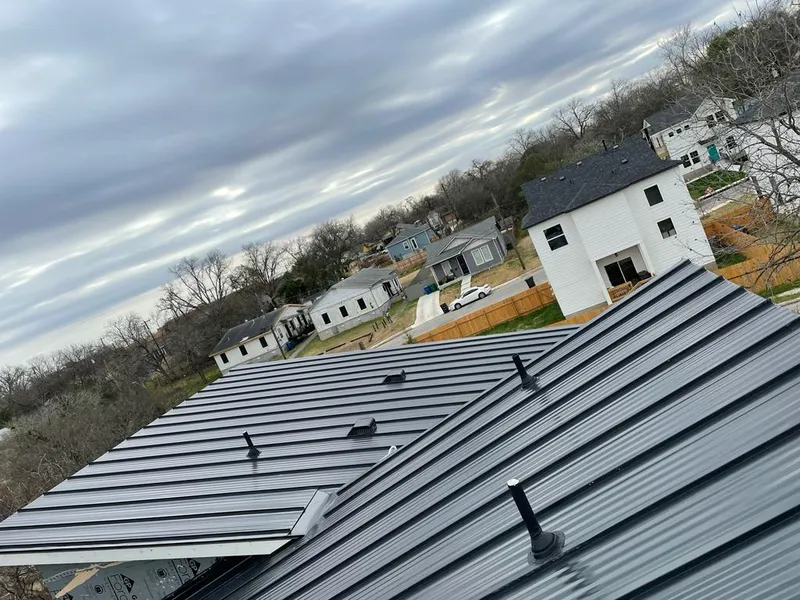 Standing seam metal roof panels with vents for Skylight Repair in Menomonie